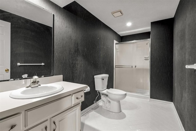 8407 W 141st St, Overland Park, KS 66223 - bathroom featuring baseboards, a shower stall, toilet, vanity, and tile patterned flooring
