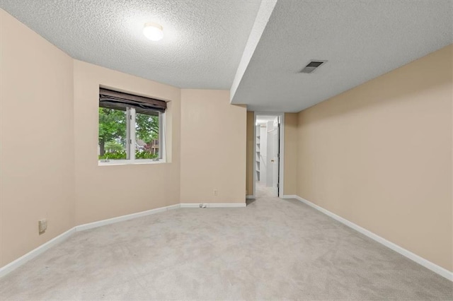 8407 W 141st St, Overland Park, KS 66223 - unfurnished room with light colored carpet, a textured ceiling, and baseboards