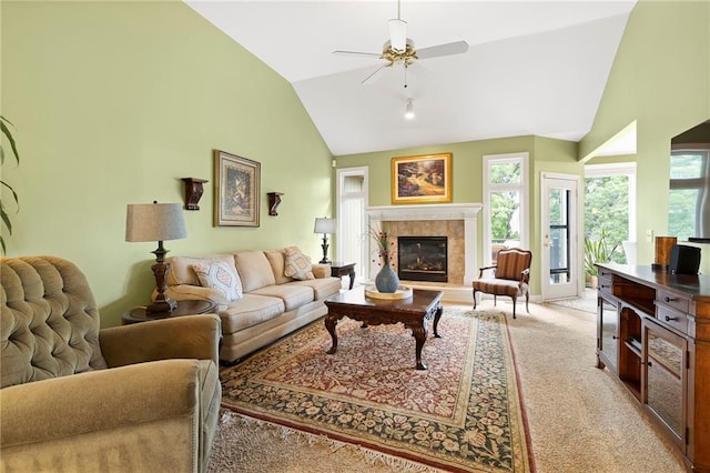 22614 W 46th Ter, Shawnee, KS 66226 - living room with ceiling fan, light colored carpet, a fireplace, and high vaulted ceiling