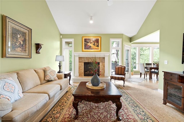 22614 W 46th Ter, Shawnee, KS 66226 - living room with a tiled fireplace and high vaulted ceiling