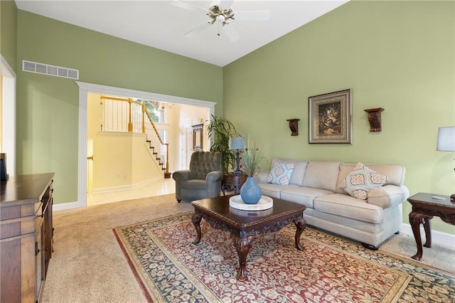 22614 W 46th Ter, Shawnee, KS 66226 - living room featuring carpet, a ceiling fan, stairs, and baseboards