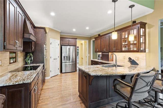 22614 W 46th Ter, Shawnee, KS 66226 - kitchen featuring stainless steel fridge with ice dispenser, a sink, premium range hood, crown molding, and a peninsula