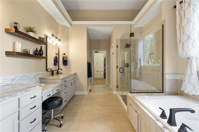 22614 W 46th Ter, Shawnee, KS 66226 - full bath featuring vanity, a bath, a stall shower, tile patterned floors, and baseboards