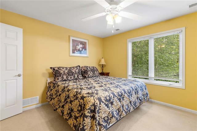 22614 W 46th Ter, Shawnee, KS 66226 - bedroom with carpet flooring, baseboards, and a ceiling fan