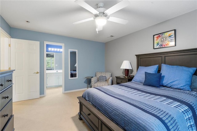 22614 W 46th Ter, Shawnee, KS 66226 - bedroom with light carpet, baseboards, ceiling fan, and connected bathroom