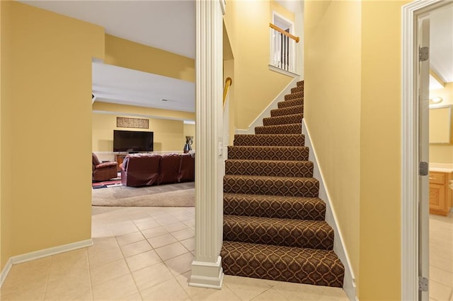 22614 W 46th Ter, Shawnee, KS 66226 - stairs featuring tile patterned flooring, carpet, and baseboards
