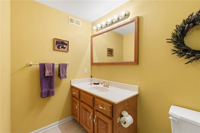 22614 W 46th Ter, Shawnee, KS 66226 - half bath featuring toilet, vanity, tile patterned flooring, and baseboards