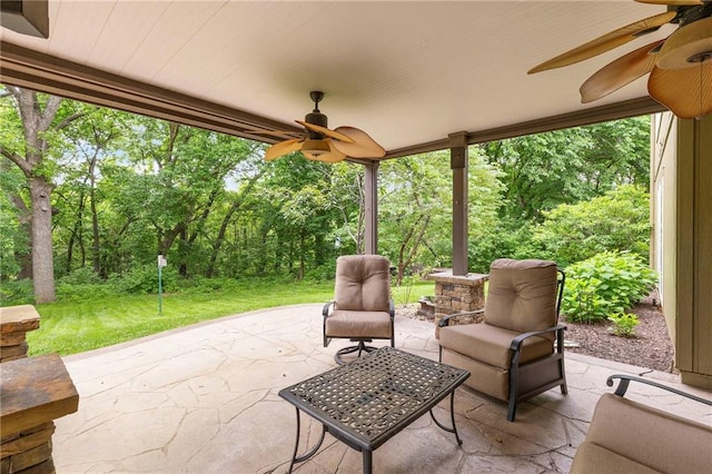 22614 W 46th Ter, Shawnee, KS 66226 - view of patio with ceiling fan and view of wooded area
