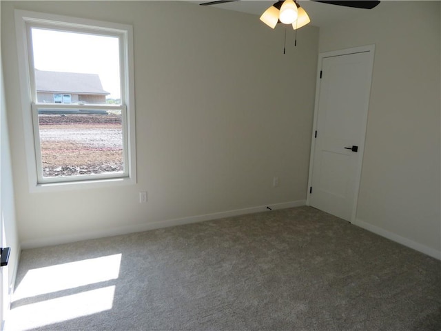 902 2nd St, Perry, KS 66073 - carpeted empty room with ceiling fan and baseboards