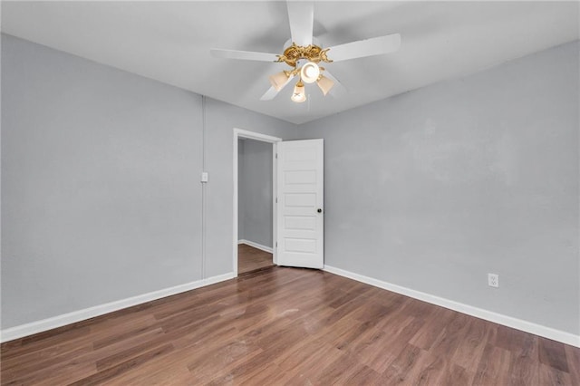 1010 N 13th St, Leavenworth, KS 66048 - unfurnished room featuring baseboards, ceiling fan, and wood finished floors
