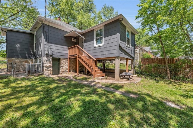 1010 N 13th St, Leavenworth, KS 66048 - rear view of property featuring a gate and stairs