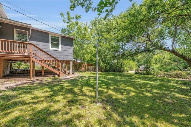 1010 N 13th St, Leavenworth, KS 66048 - view of grassy yard with stairway and a wooden deck