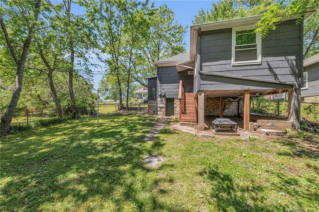 1010 N 13th St, Leavenworth, KS 66048 - back of house featuring stairs and stone siding