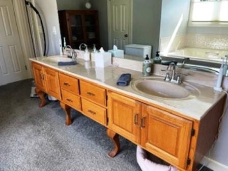 bathroom with double vanity and toilet