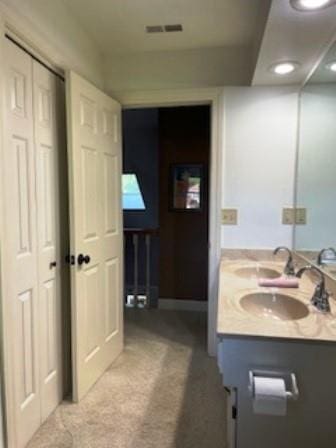 bathroom with double vanity