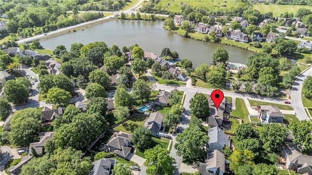 2007 NE Newport Ct, Blue Springs, MO 64014 - aerial view of property's location featuring a nearby body of water and nearby suburban area