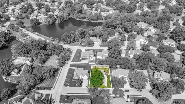 2007 NE Newport Ct, Blue Springs, MO 64014 - aerial view of residential area featuring a large body of water and property parcel outlined