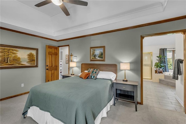 2007 NE Newport Ct, Blue Springs, MO 64014 - bedroom featuring a tray ceiling, carpet floors, connected bathroom, and baseboards