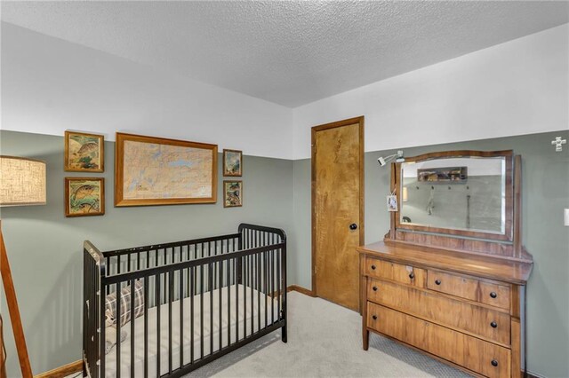 2007 NE Newport Ct, Blue Springs, MO 64014 - bedroom with carpet flooring and a textured ceiling