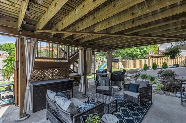 2007 NE Newport Ct, Blue Springs, MO 64014 - fenced backyard featuring an outdoor hangout area, a patio area, and stairs