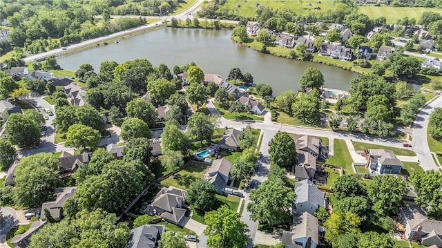 2007 NE Newport Ct, Blue Springs, MO 64014 - aerial overview of property's location featuring nearby suburban area and a large body of water