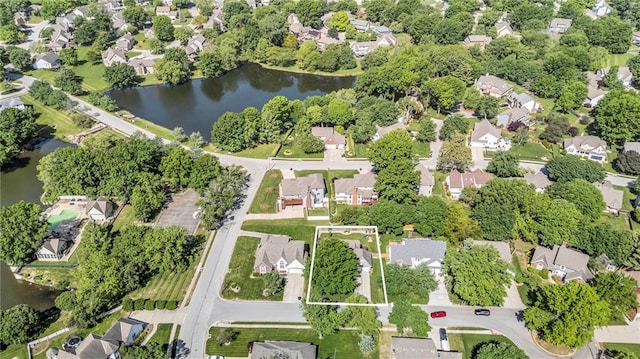 2007 NE Newport Ct, Blue Springs, MO 64014 - aerial view of property and surrounding area featuring nearby suburban area and a large body of water
