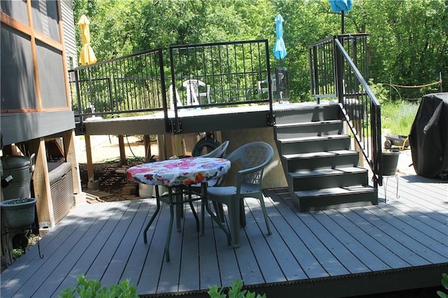 1658 NW 785th Rd, Bates City, MO 64011 - deck with stairway and a grill
