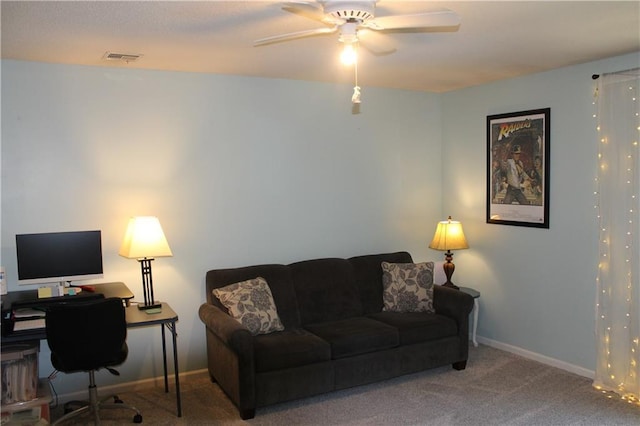 1658 NW 785th Rd, Bates City, MO 64011 - living room featuring carpet, a ceiling fan, a desk, and baseboards