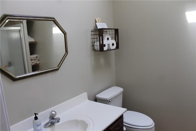 1658 NW 785th Rd, Bates City, MO 64011 - bathroom with toilet, vanity, and an enclosed shower