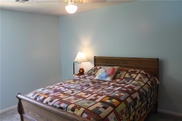 1658 NW 785th Rd, Bates City, MO 64011 - bedroom with carpet floors, baseboards, and ceiling fan