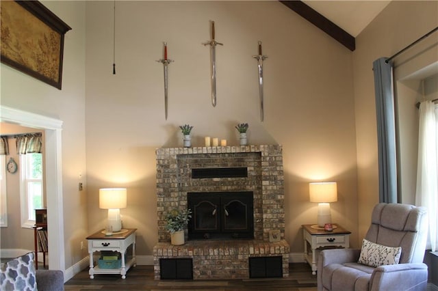 1658 NW 785th Rd, Bates City, MO 64011 - living area with high vaulted ceiling, dark wood-style flooring, a fireplace, and baseboards