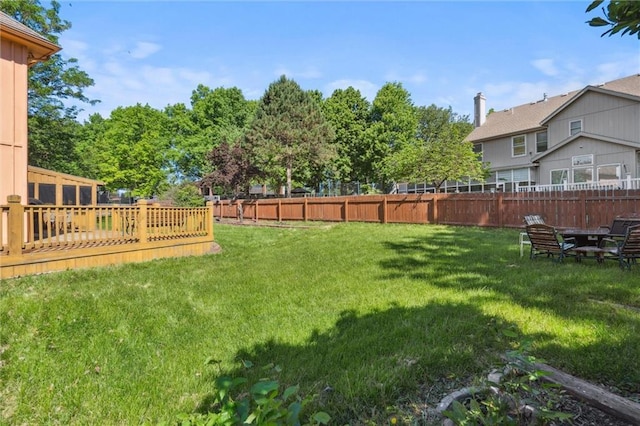 view of yard featuring a deck