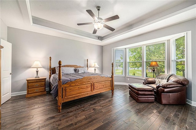 4310 N 141st Pl, Basehor, KS 66007 - bedroom featuring a raised ceiling, wood finished floors, baseboards, a ceiling fan, and ornamental molding