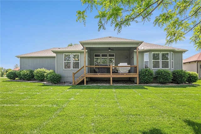 4310 N 141st Pl, Basehor, KS 66007 - back of property with a ceiling fan, a lawn, and a wooden deck
