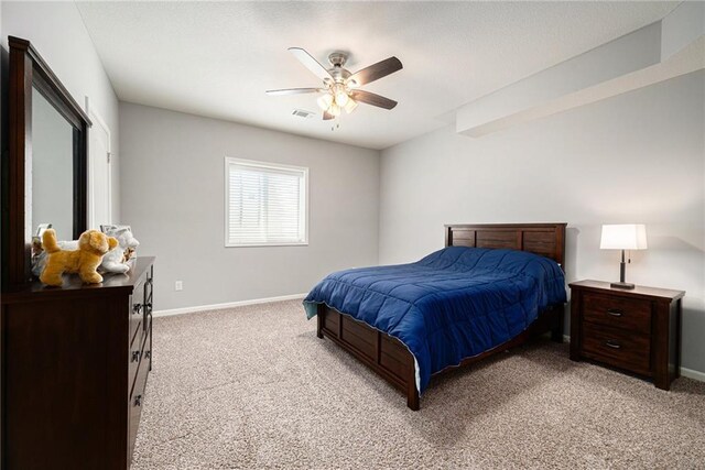4310 N 141st Pl, Basehor, KS 66007 - bedroom with light colored carpet, baseboards, and ceiling fan