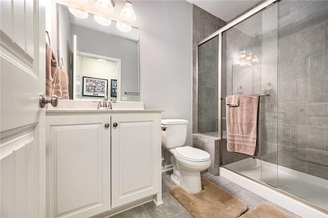 4310 N 141st Pl, Basehor, KS 66007 - full bath with vanity, toilet, a shower stall, and tile patterned floors