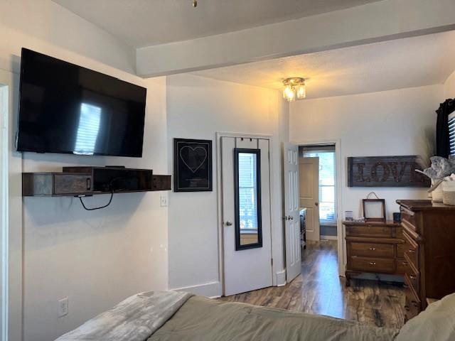 bedroom with wood finished floors