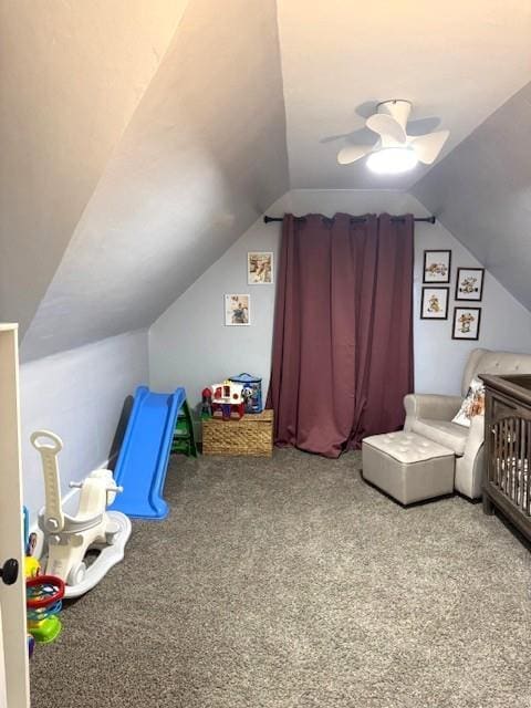 carpeted bedroom with lofted ceiling and ceiling fan