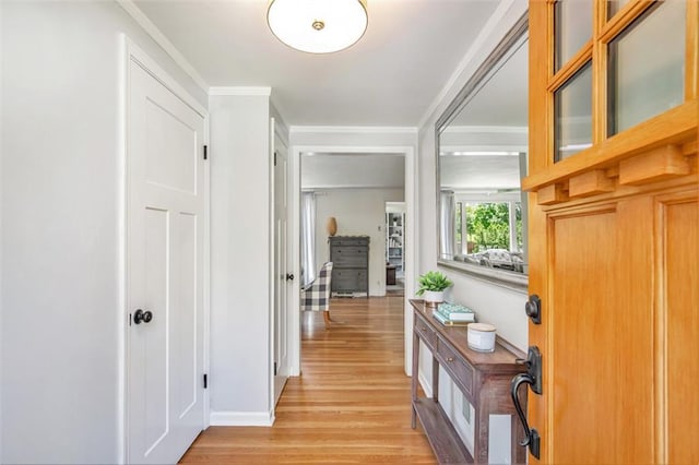 7408 Ash St, Prairie Village, KS 66208 - foyer featuring light wood-style flooring and crown molding