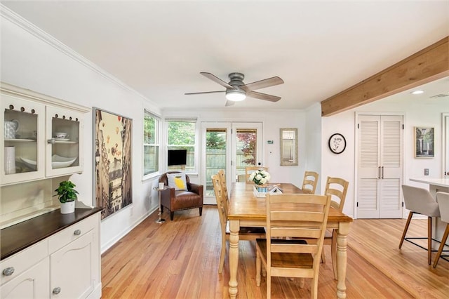 7408 Ash St, Prairie Village, KS 66208 - dining area with a ceiling fan, crown molding, and light wood-style flooring