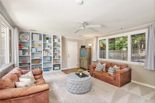 7408 Ash St, Prairie Village, KS 66208 - living area featuring baseboards, ceiling fan, crown molding, and carpet flooring
