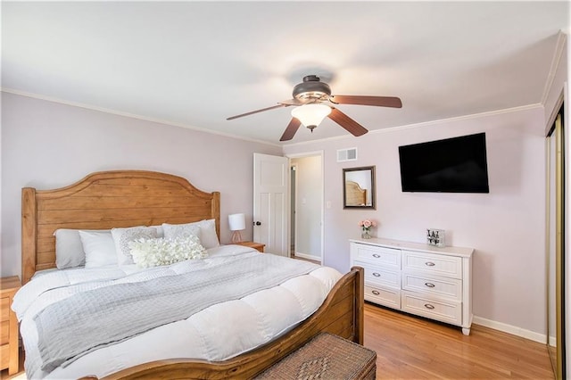 7408 Ash St, Prairie Village, KS 66208 - bedroom with light wood-style flooring, crown molding, a ceiling fan, and baseboards
