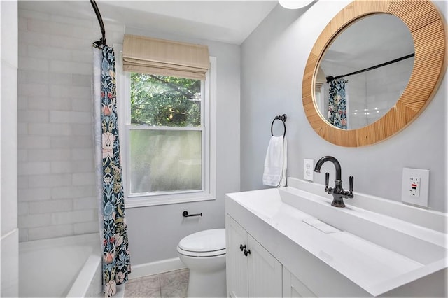 7408 Ash St, Prairie Village, KS 66208 - bathroom featuring vanity, toilet, shower / bath combo with shower curtain, and baseboards
