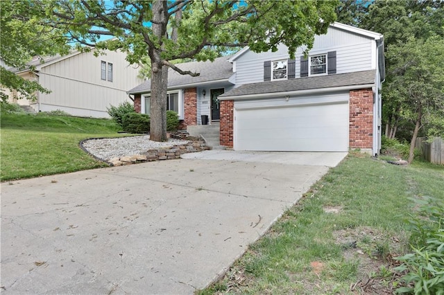 split level home with brick siding, concrete driveway, a front yard, and a garage