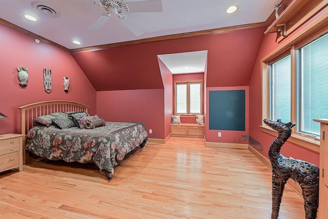 bedroom with light wood finished floors, baseboards, crown molding, recessed lighting, and vaulted ceiling