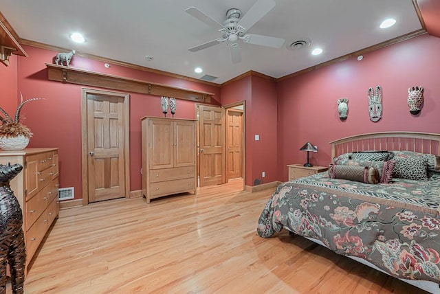 bedroom with light wood-style floors, crown molding, baseboards, recessed lighting, and a ceiling fan
