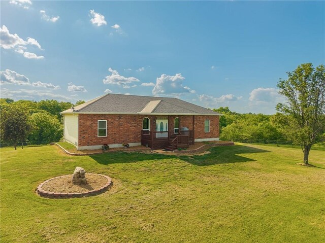 23780 Moberly Rd, Polo, MO 64671 - back of property featuring brick siding and a shingled roof