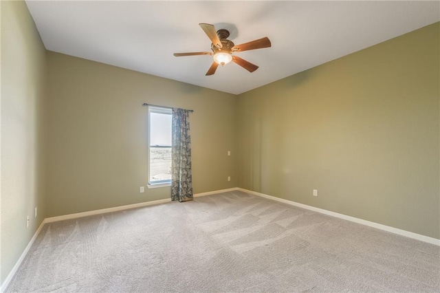 23780 Moberly Rd, Polo, MO 64671 - spare room featuring ceiling fan, light carpet, and baseboards