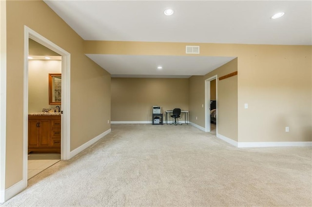 23780 Moberly Rd, Polo, MO 64671 - empty room with light colored carpet, an office area, baseboards, and recessed lighting
