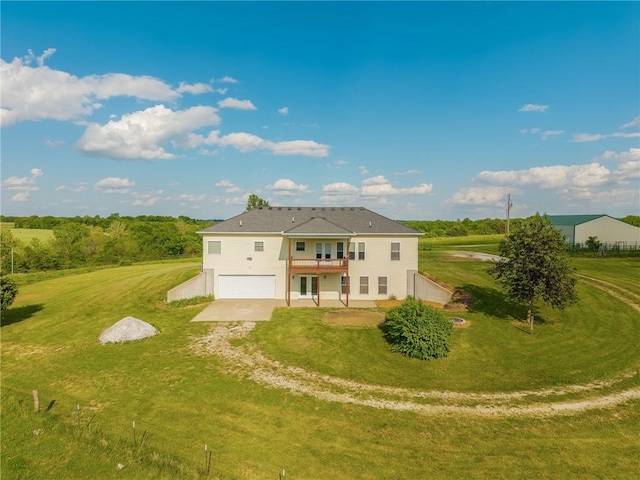 23780 Moberly Rd, Polo, MO 64671 - rear view of house with driveway, a garage, and a lawn